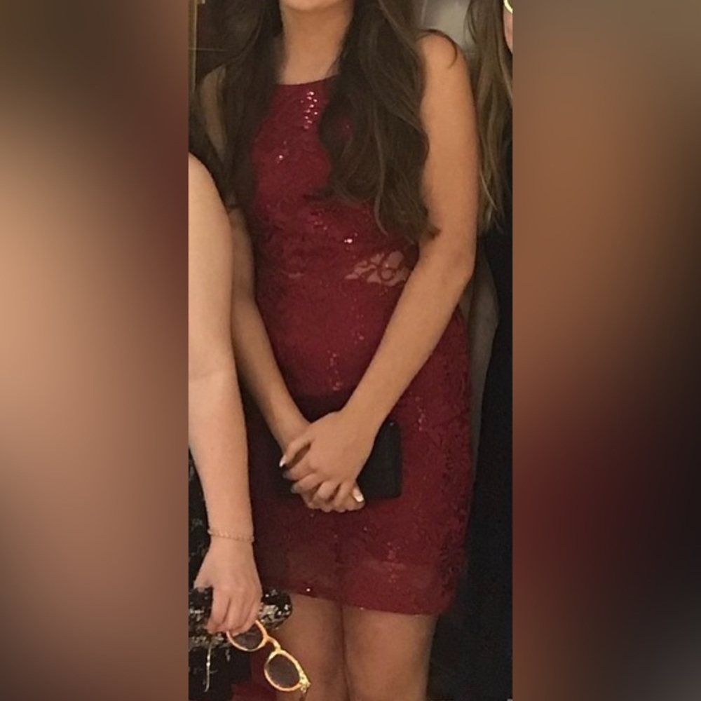 Red Dress// Size 5// Worn once// see through sides//